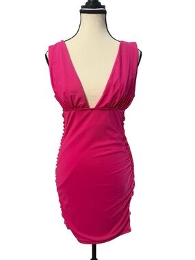 Pink bodycon dress with deep v-neckline and ruched sides Large